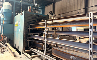 Sandblasting of steel components at Showhoo factory